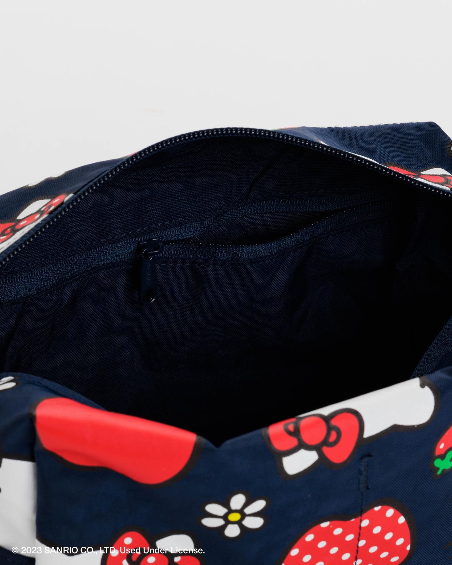 Dopp Kit in Hello Kitty Apple from BAGGU